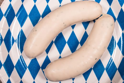 White sausages on a plate in blue and white