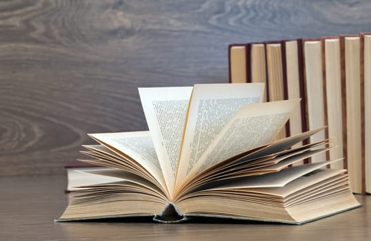 books on a wooden background