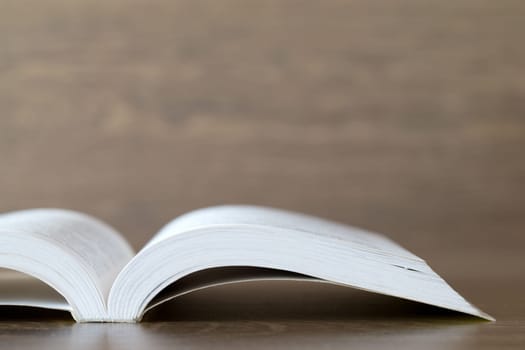 books on wooden deck tabletop