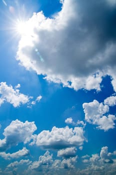 blue sky background with tiny clouds