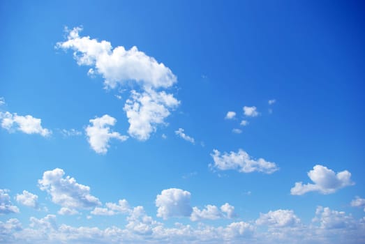 Blue sky background with a tiny clouds