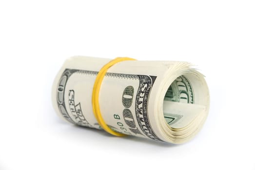 Roll of dollars close-up against white background.