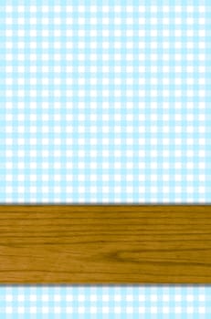 Light blue checkered background with wooden board