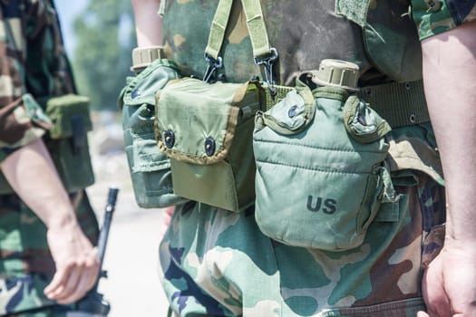Two soldiers during the military operation shot from behind