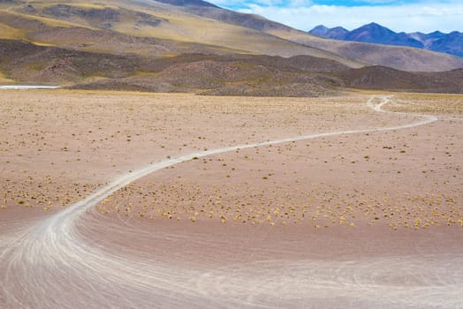 Tire tracks in the high plains desert near Uyuni, Bolivia