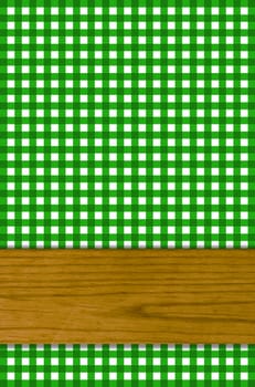 Dark green checkered tablecloth with crossbeam for text