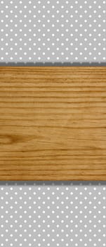 Dotted grey background with wooden board for text