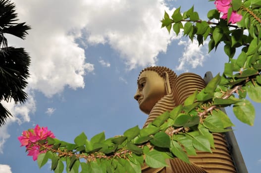 Golden Buddha at the Golden Temple of Dambulla Cave Temple, Sri Lanka.