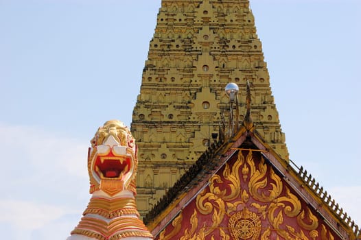 Burmese temple with lion in traditional architecture in Sangkhlaburi, Thailand