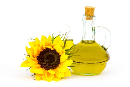 sunflower oil and sunflowers isolated on white background