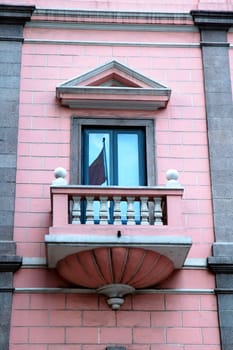 The small balcony and window of antique house