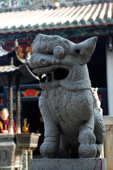 A stone lion of Chinese temple, Kum Iam temple, Macau
