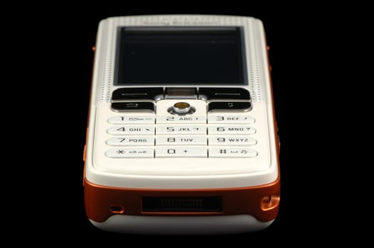 Close up of modern mobile phone over black