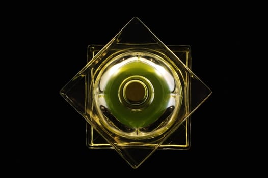 An abstract view of perfume bottle from top