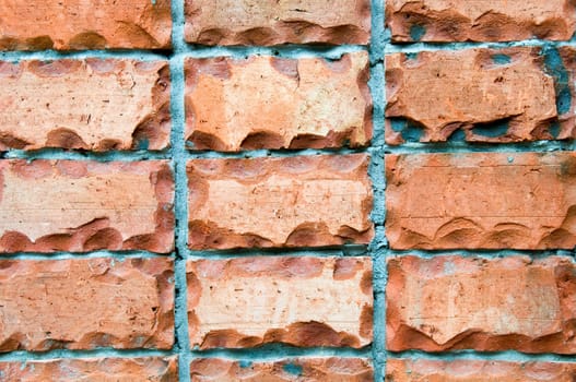 The abstract pattern of wall constructed with bricks