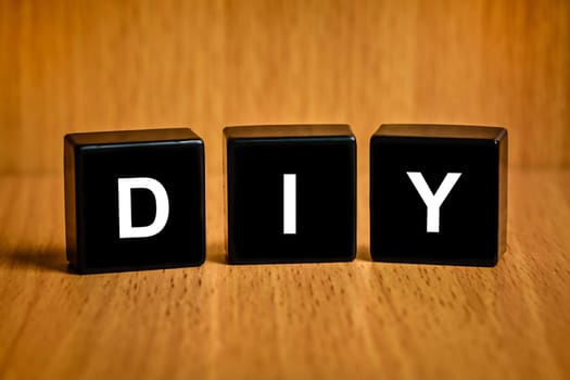 DIY or Do it yourself text on black block