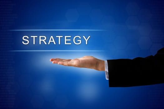 strategy button with business hand on a touch screen interface