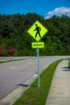 Pedestrian sign in a sunny day at a local road