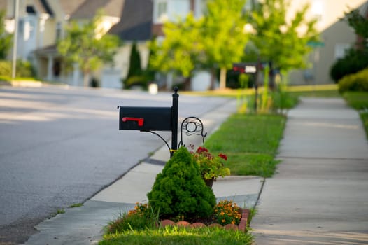 Black Mail Box in Front of a House