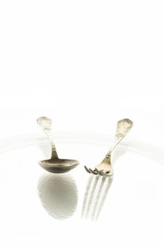 Spoon and fork with text clearance in portrait format