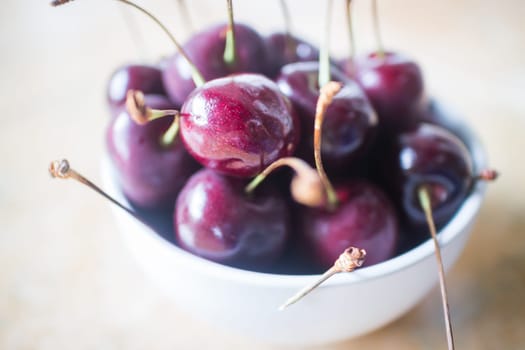 Close up fresh sweet cherry in a bowl, stock photo