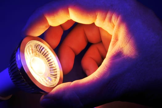 Changing an LED at night in blue light