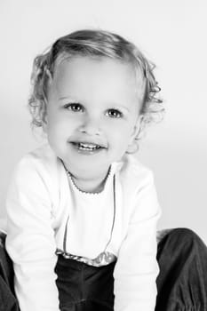 little girl looks forward to photographer