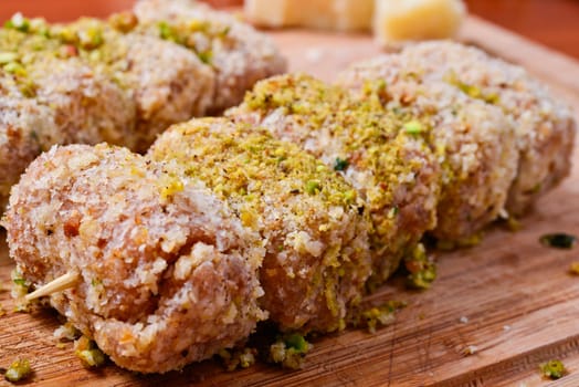 meat rolls with cream cheese and pistachio