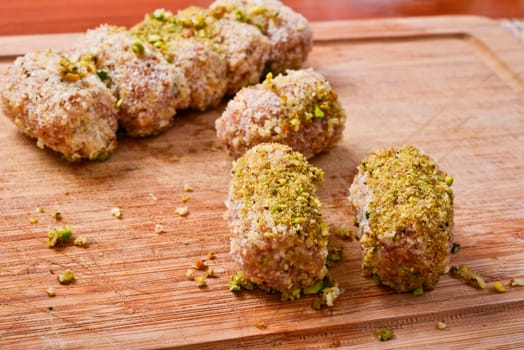 meat rolls with cream cheese and pistachio