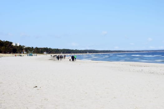 Binz,Germany - April 02,2013: The Baltic Sea beach of the seaside resort of Binz on April 2,2013 in Binz with unknown people.
