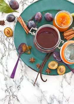 Various jams of fresh plums with wintry swirls