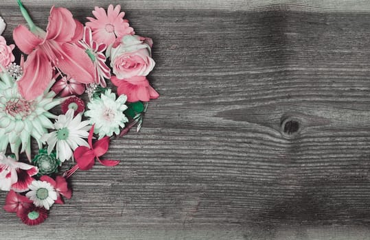 Flower heart on wood