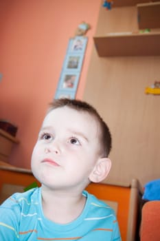 detail of face boy at home