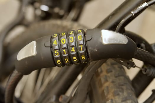 Close up on padlock with numbers for bicycle