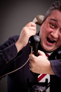 a clerk that can't manage to answer the whole of telephone calls he receives and is very uncomfortable with this