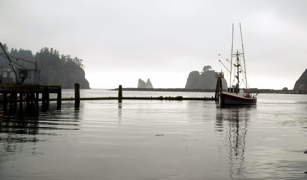 A fishing vessel pulls in the fuel up at the Marina in LaPush