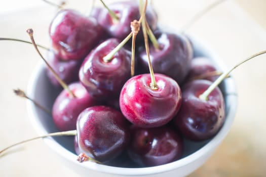 Fresh sweet cherry in a bowl, stock photo