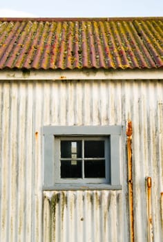 Rust Moss Wear and Tear show on this Outpost Outbuilding