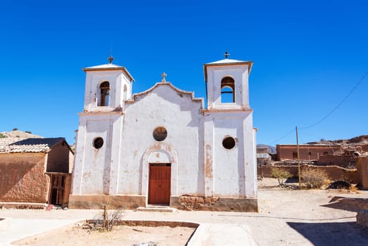 White old historic church in the small town of Chacopampa near Tupiza, Bolivia