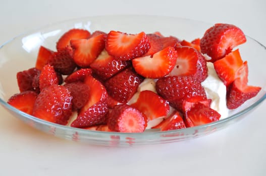 Fresh strawberries and yogurt dessert fruit background.