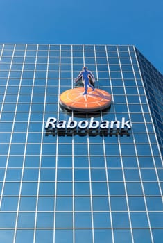 logo on the rabobank headquarters building in utrecht, netherlands. Rabobank is a Dutch bank, consisting of 136 (2013) independent cooperatives with all its own banking license from the Dutch Central Bank
