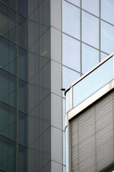 The photograph of the corner edge of a modern building.