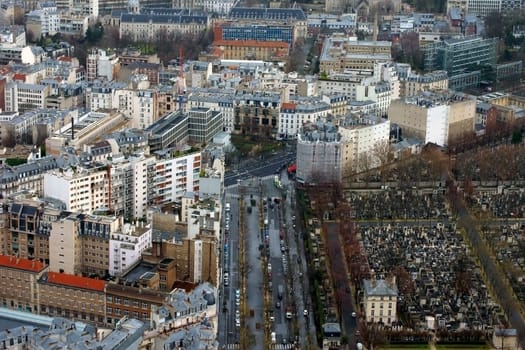 Paris,France – December 31,2013: An aerial view of a cemetery,infrastructure and transport on December 31,2013 in Paris.