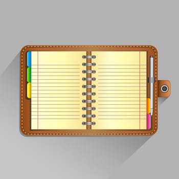 The open organizer with pen and top view shadow on the gray background