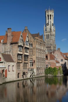 View from the Rozenhoedkaai of the Old Town of Bruges (Bruges, Belgium). Vertically.