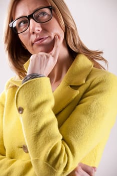 real woman thinking about the future or an idea