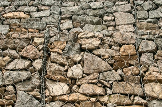 Gabion plastic covered wire mesh baskets filled with stone for slope stabilization