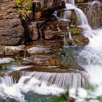 Waterfall and cascades on river