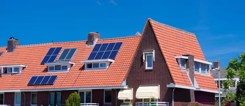 solar panels on a red roof in utrecht, netherlands
