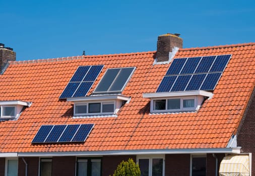 solar panels on a red roof in utrecht, netherlands